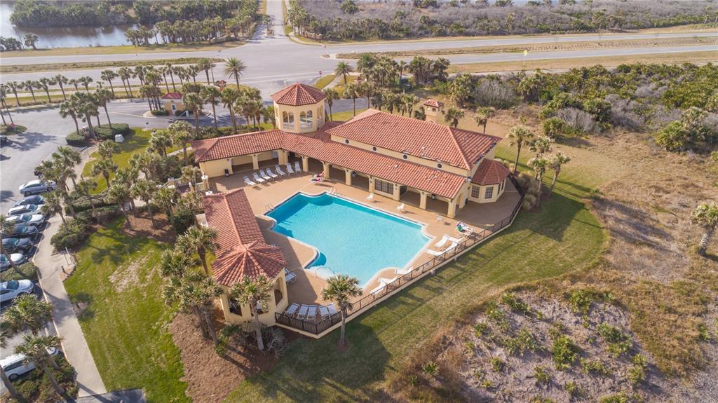 60 Surfview Drive, Unit 502 Palm Coast, FL 32137 - Photo 38 of 63 a view of a city with lawn chairs