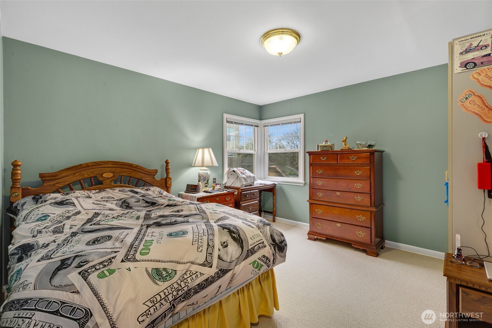 929 Northwest 59th Street Seattle, WA 98107 - Photo 13 of 38 a bedroom with a bed and a cabinets