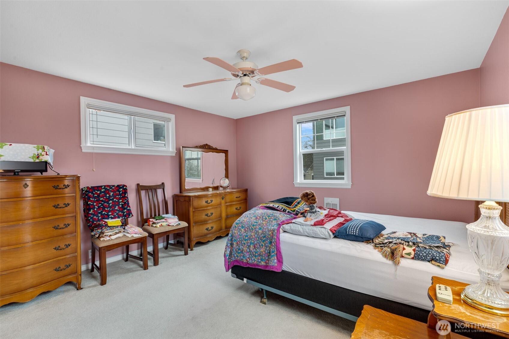 929 Northwest 59th Street Seattle, WA 98107 - Photo 15 of 38 a bedroom with bed and a window