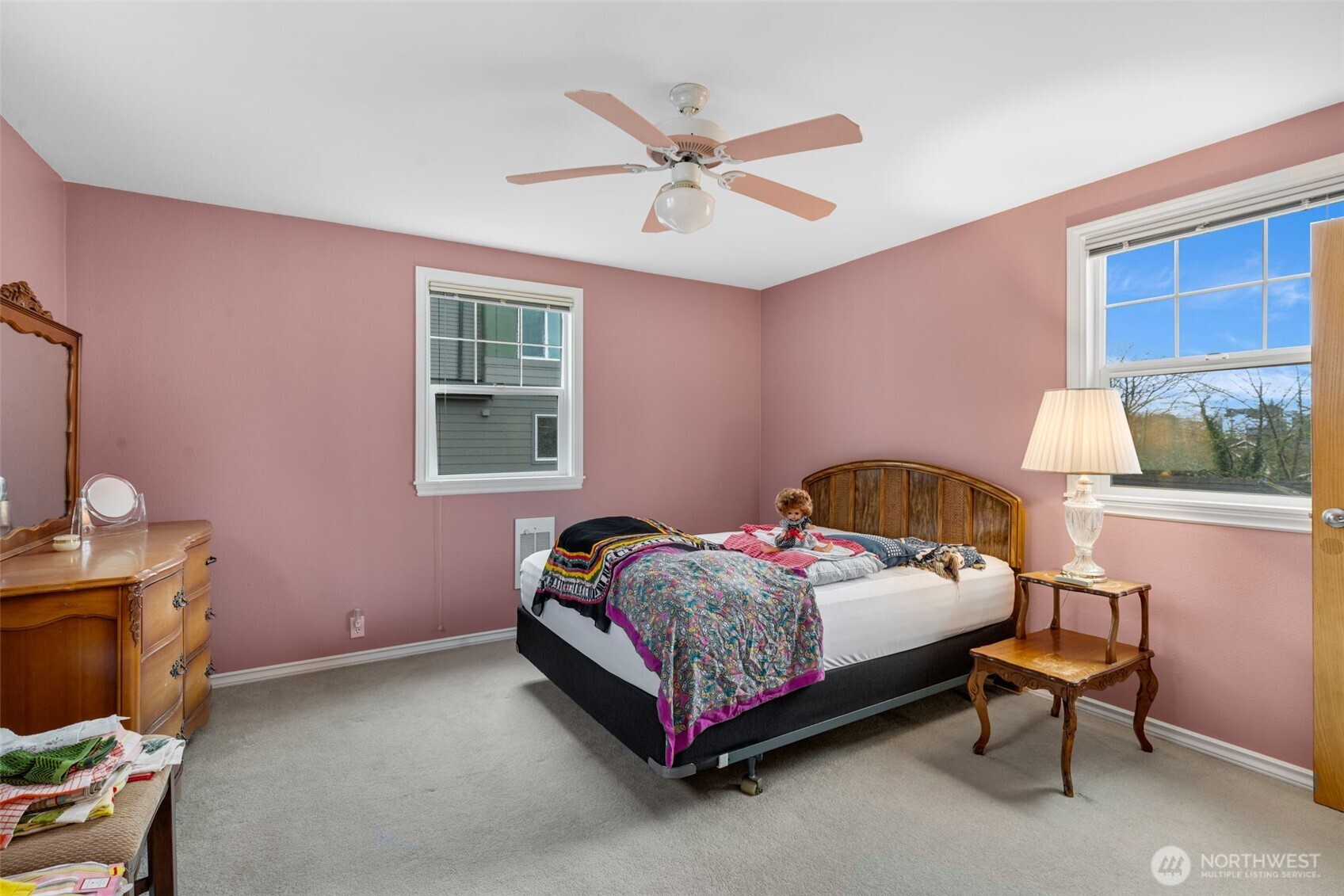 929 Northwest 59th Street Seattle, WA 98107 - Photo 16 of 38 a bed room with a bed and a window