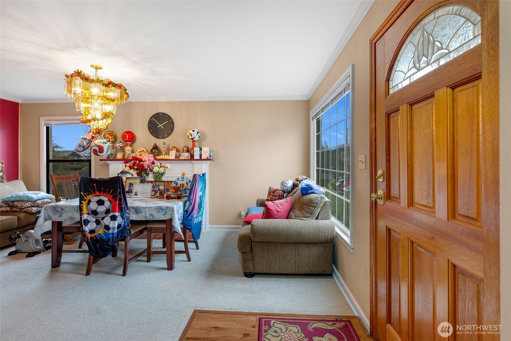 929 Northwest 59th Street Seattle, WA 98107 - Photo 4 of 38 a living room filled with furniture and a couch