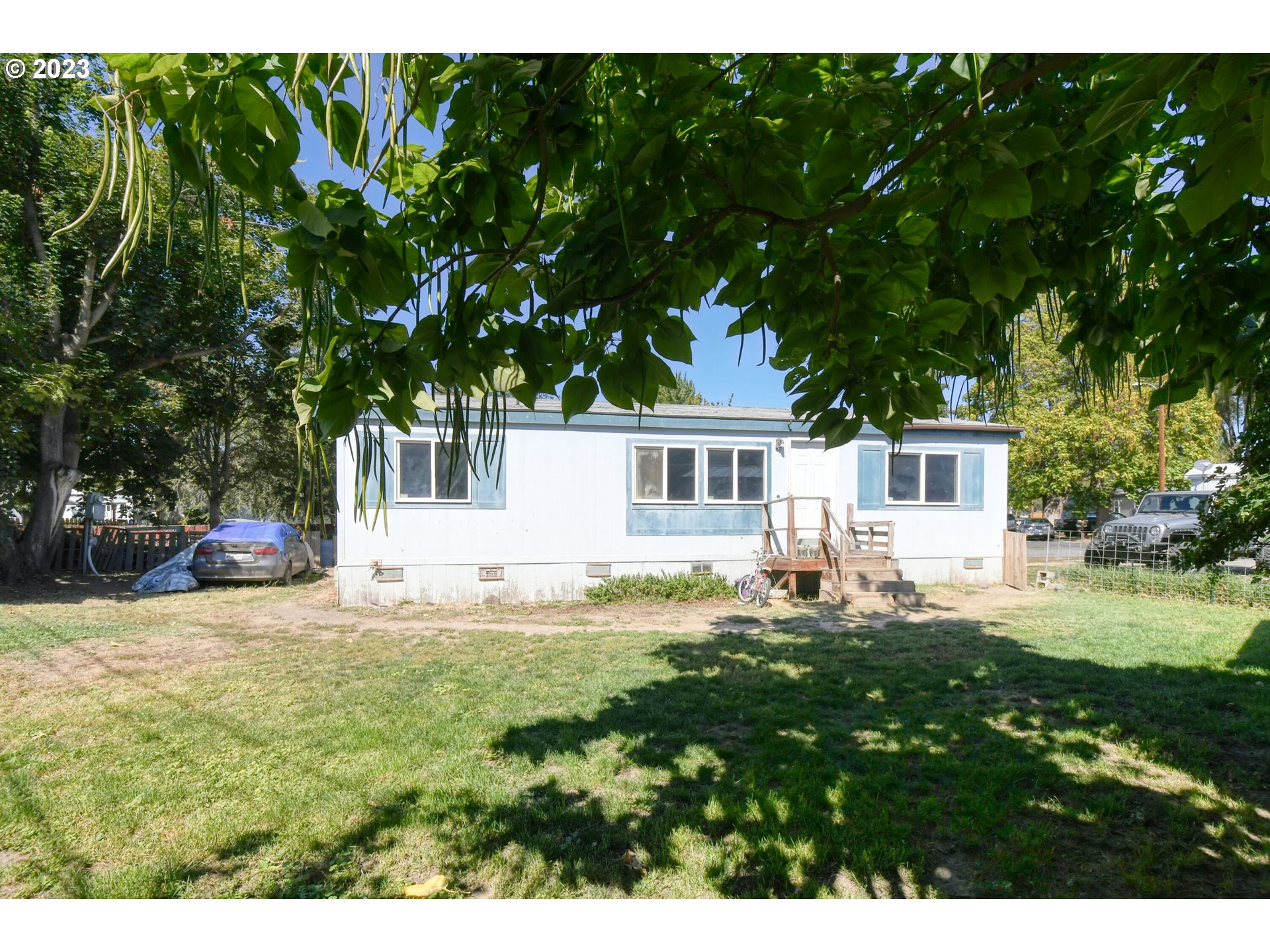 1437 Southwest 37th Street, Unit 14 Pendleton, OR 97801 - Photo 1 of 14 a house view with a sitting space and garden
