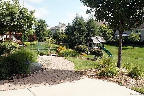 544 Springview Drive Rochester, MI 48307 - Photo 21 of 25 Paver walkway to rear yard