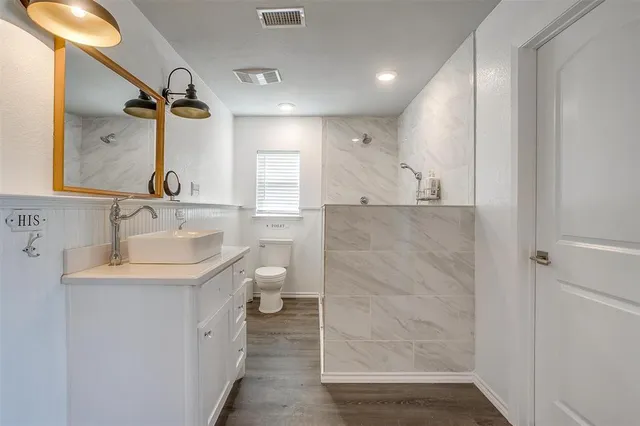 a view of a backyard with sitting area