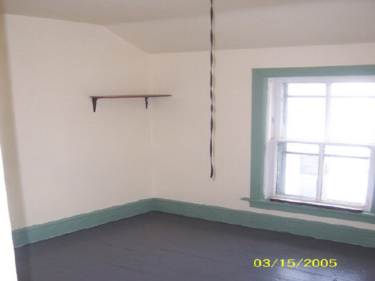 621 Chestnut Lerna, IL 62440 - Photo 3 of 4 a room that has a window in it