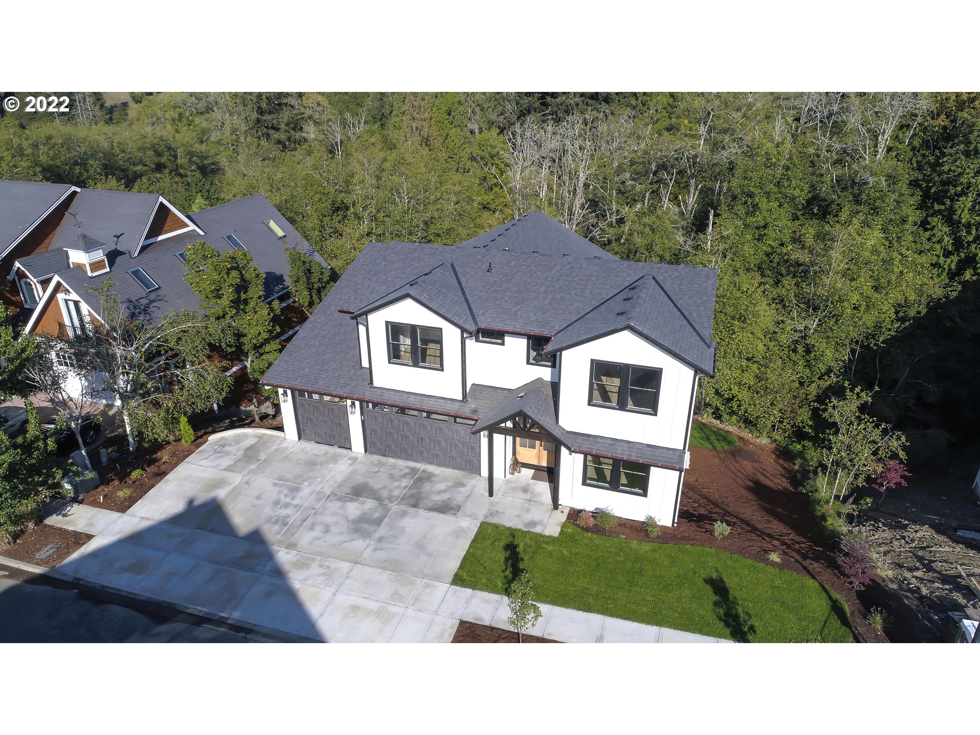 700 South 19th Place Ridgefield, WA 98642 - Photo 3 of 32 a house view with a garden