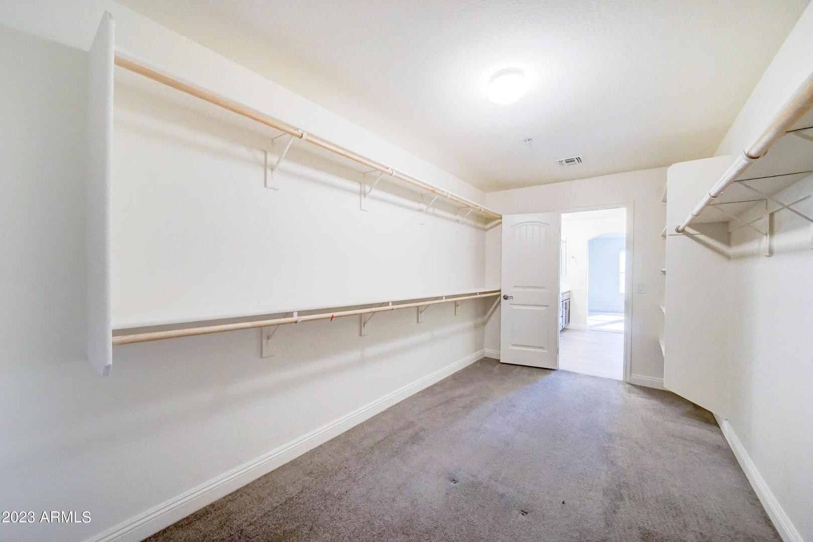 2297 North Alsap Road Buckeye, AZ 85396 - Photo 18 of 36 a view of an empty room