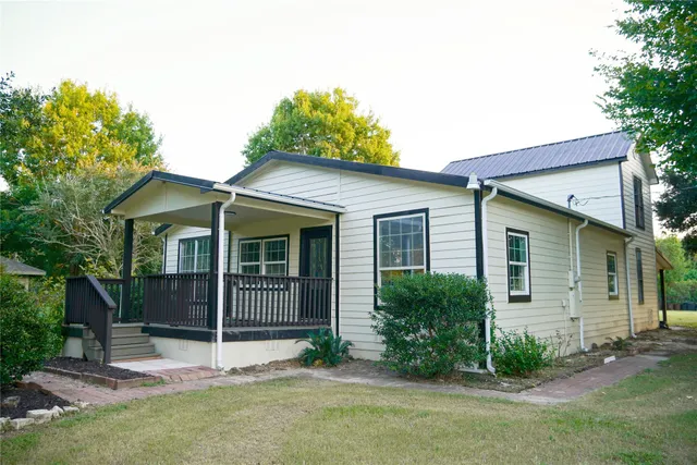 front view of a house and a yard