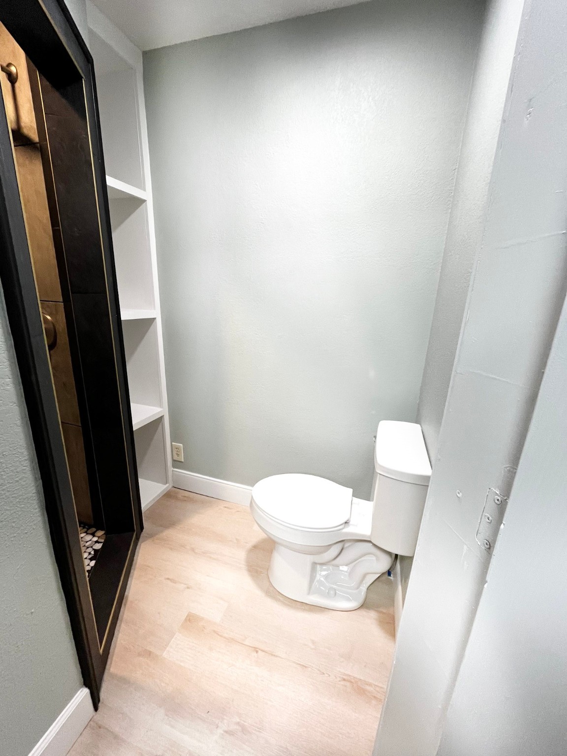 4622 Hill Side Lane Needville, TX 77461 - Photo 14 of 19 a white toilet sitting next to a sink