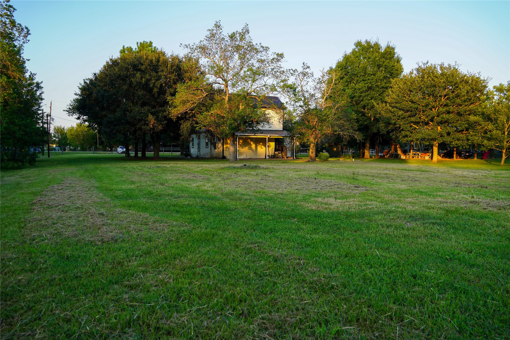 4622 Hill Side Lane Needville, TX 77461 - Photo 3 of 19 a big yard with large trees