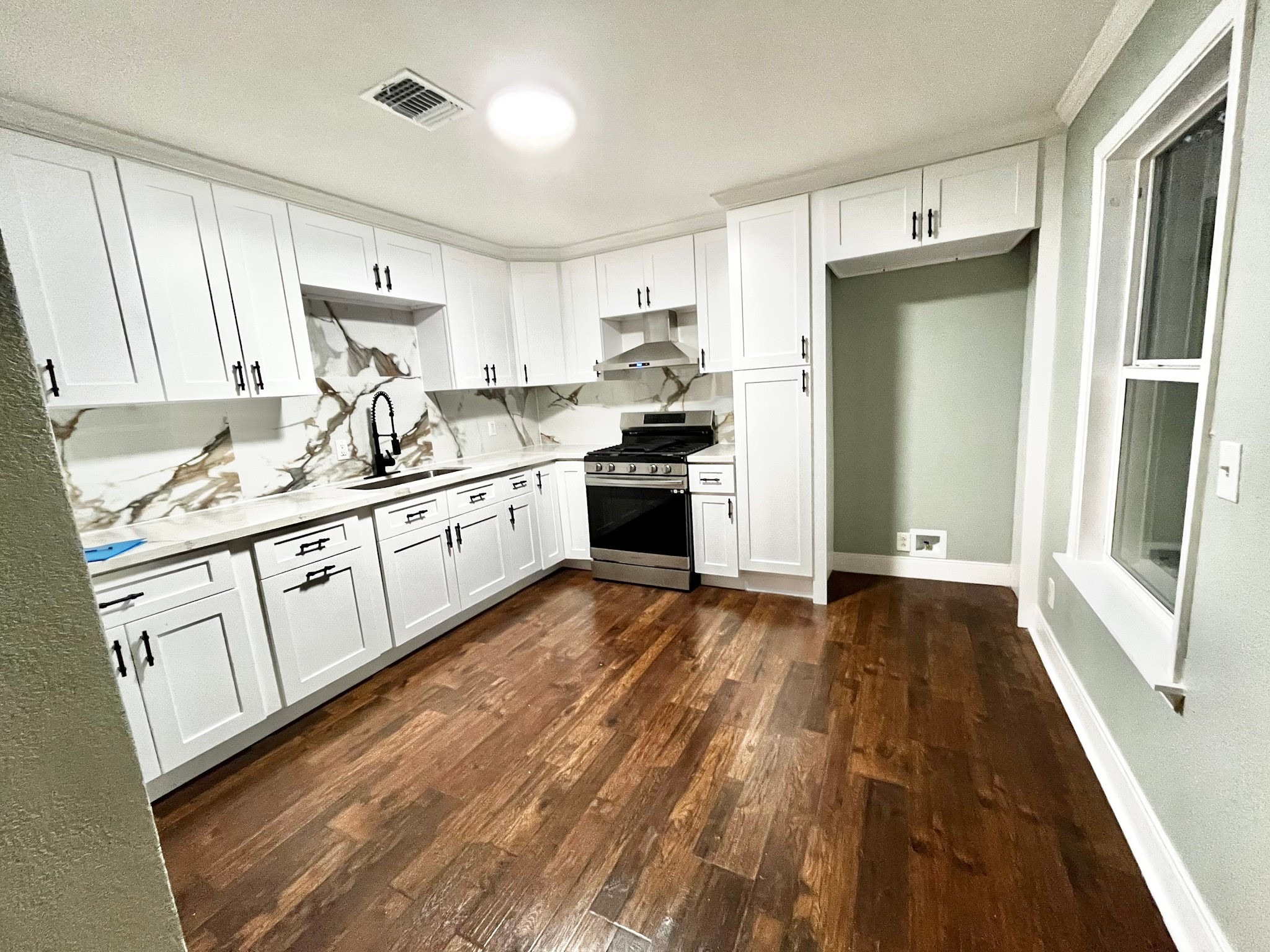 4622 Hill Side Lane Needville, TX 77461 - Photo 8 of 19 a kitchen with stainless steel appliances granite countertop a refrigerator and a stove top oven