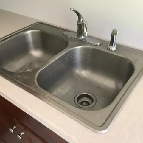 a kitchen with a stove and a microwave