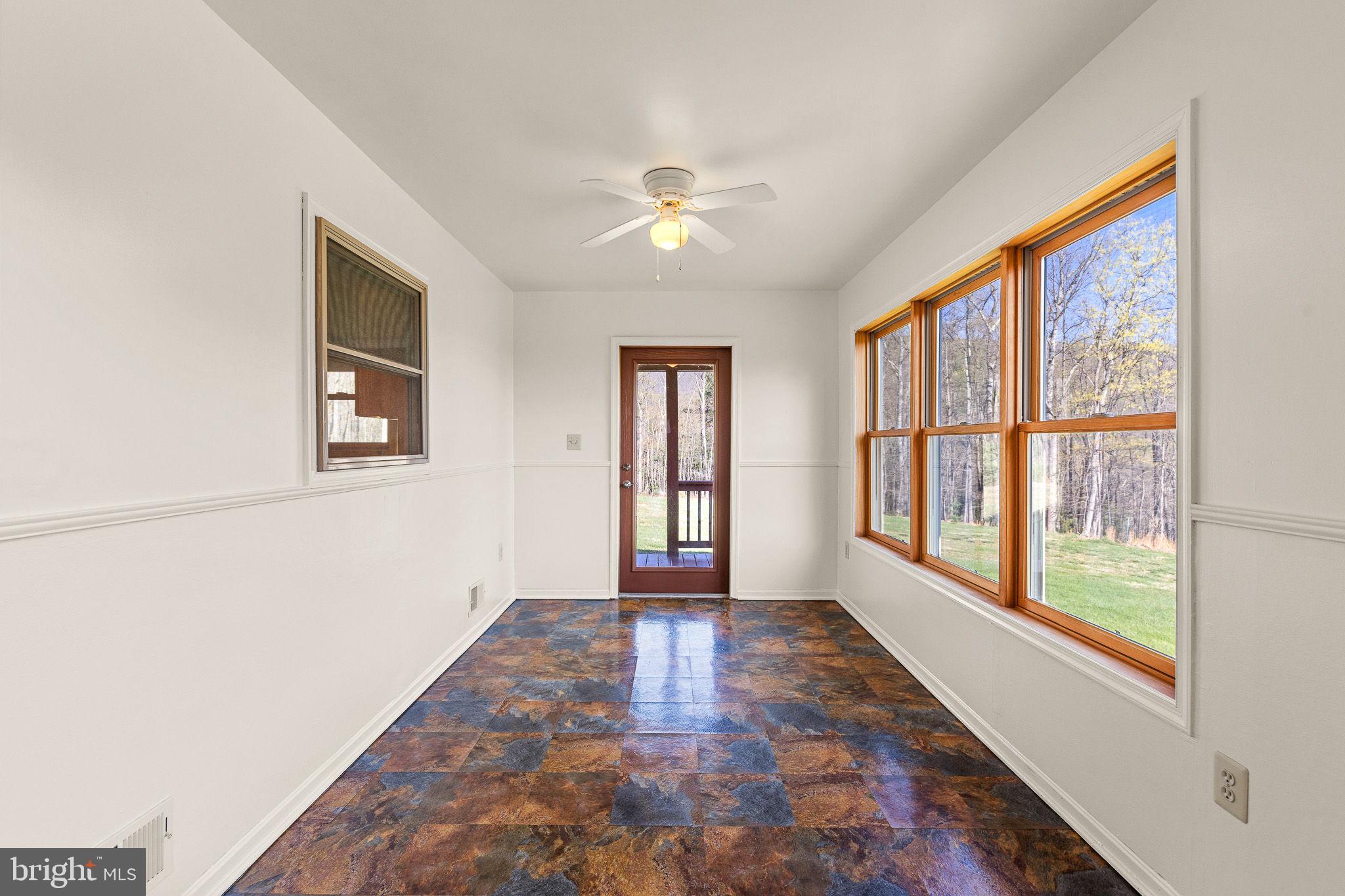 224 Oates Road Star Tannery, VA 22654 - Photo 14 of 49 Sun Room w/ exterior door