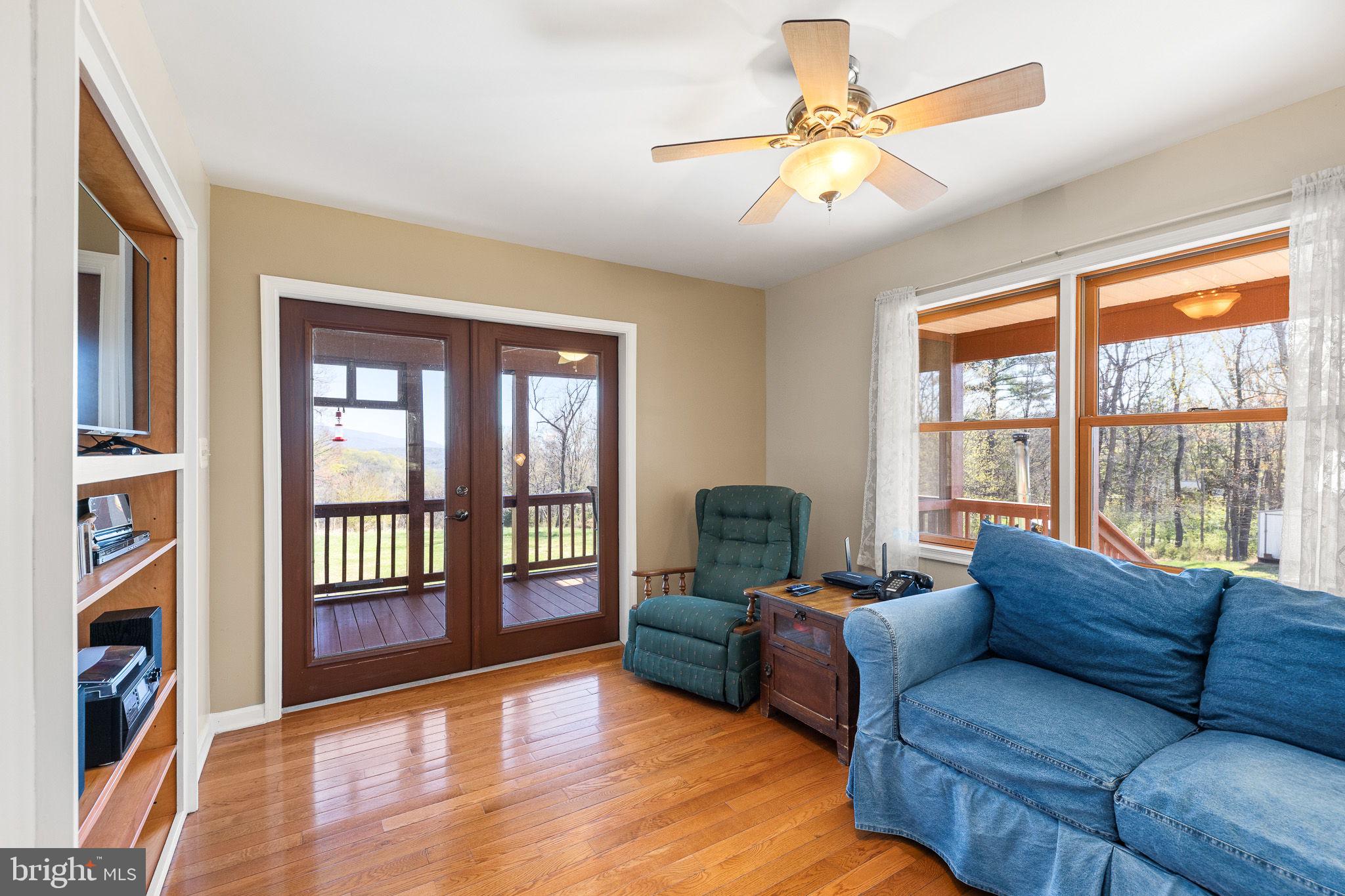 224 Oates Road Star Tannery, VA 22654 - Photo 22 of 49 access to Screened Porch