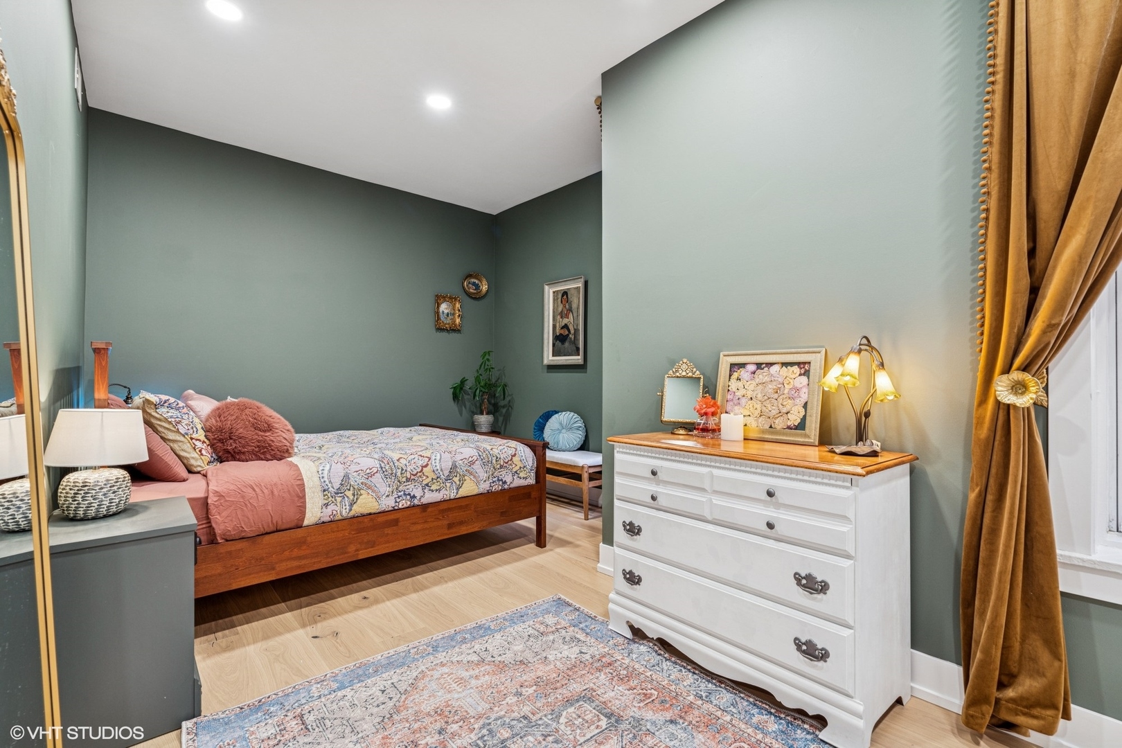 5103 North Clark Street, Unit 2 Chicago, IL 60640 - Photo 11 of 21 a bedroom with a bed and a dresser