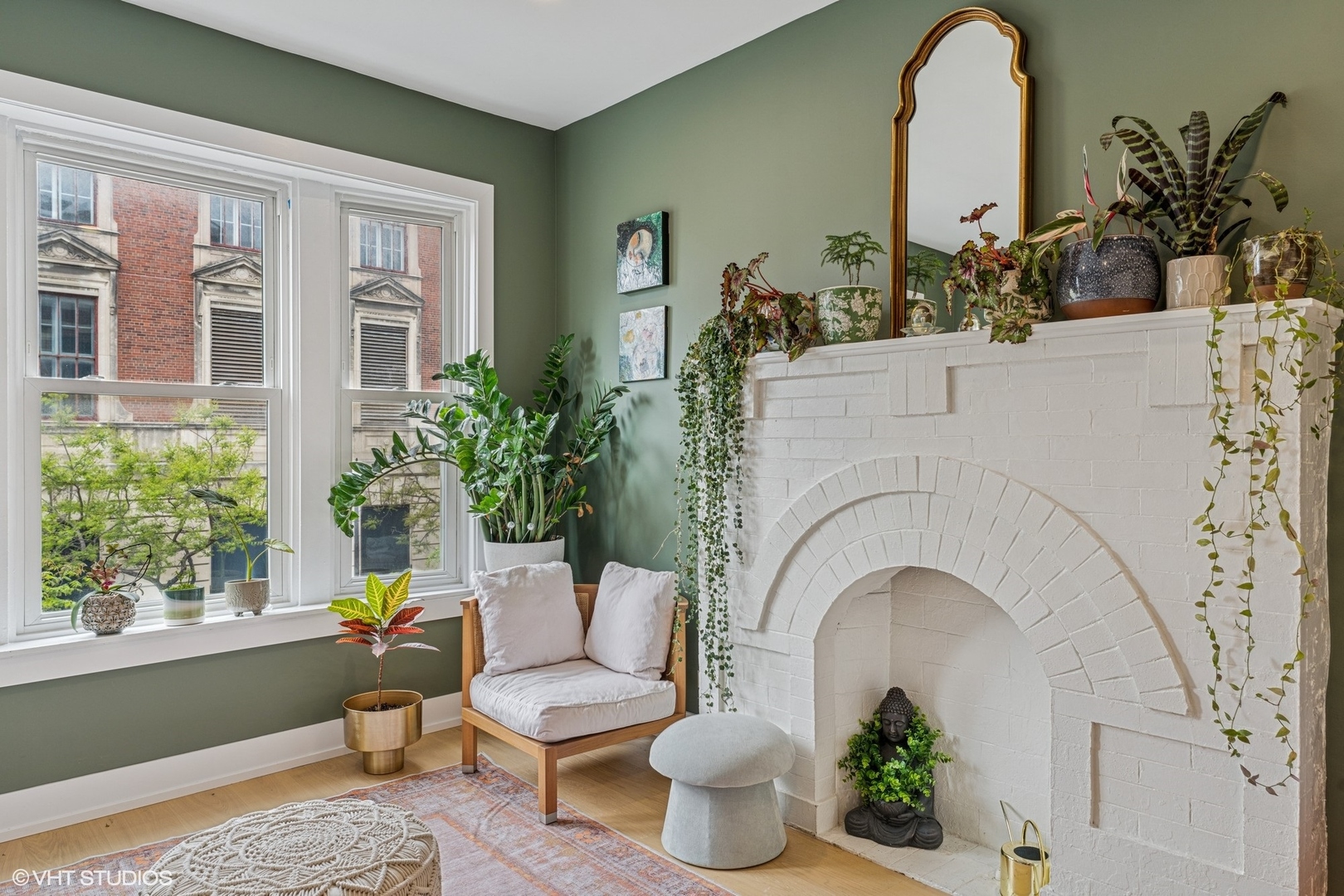 5103 North Clark Street, Unit 2 Chicago, IL 60640 - Photo 16 of 21 a living room with furniture a potted plant and a large window