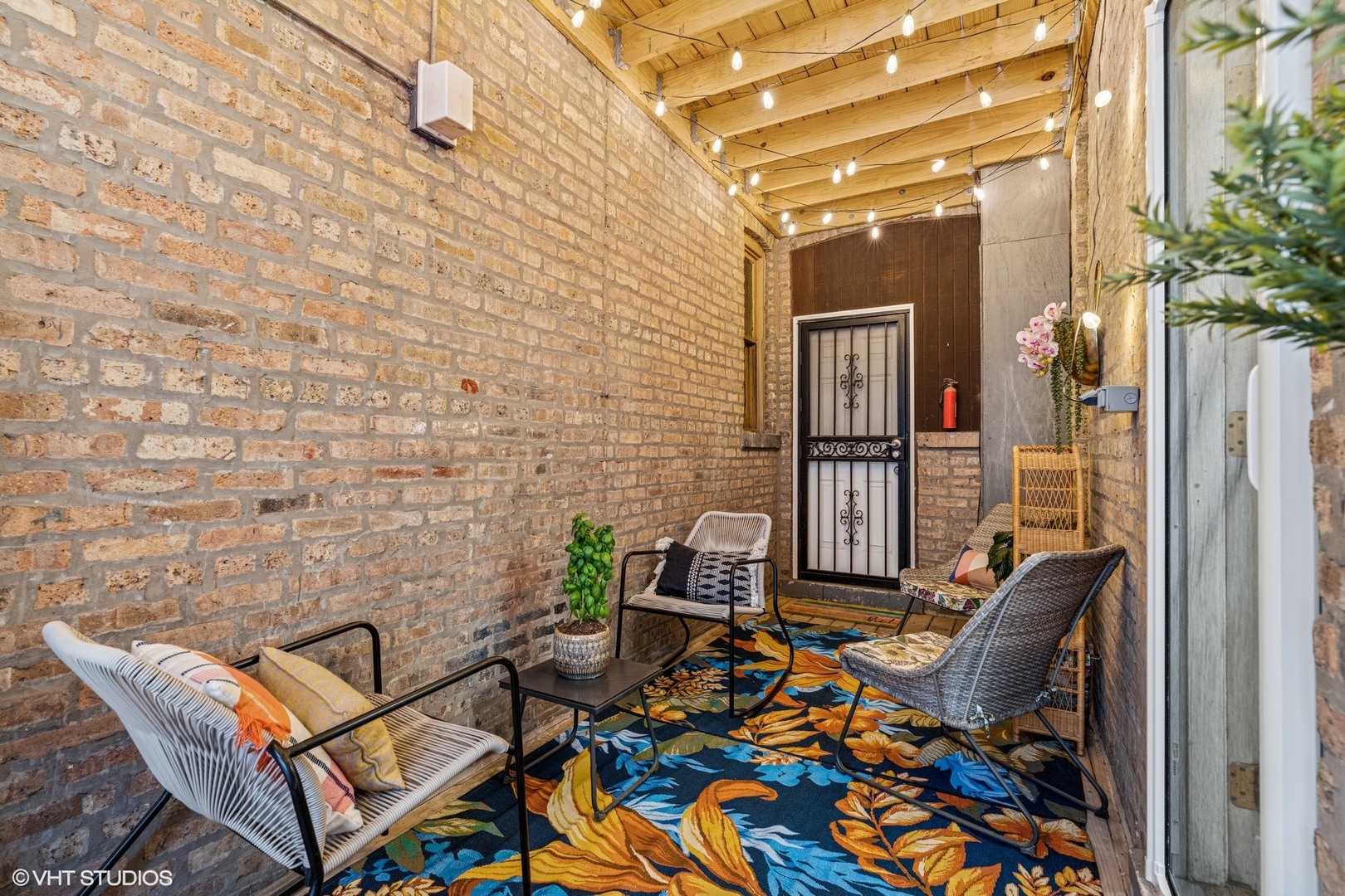 5103 North Clark Street, Unit 2 Chicago, IL 60640 - Photo 20 of 21 a couple of chairs sitting in front of a door
