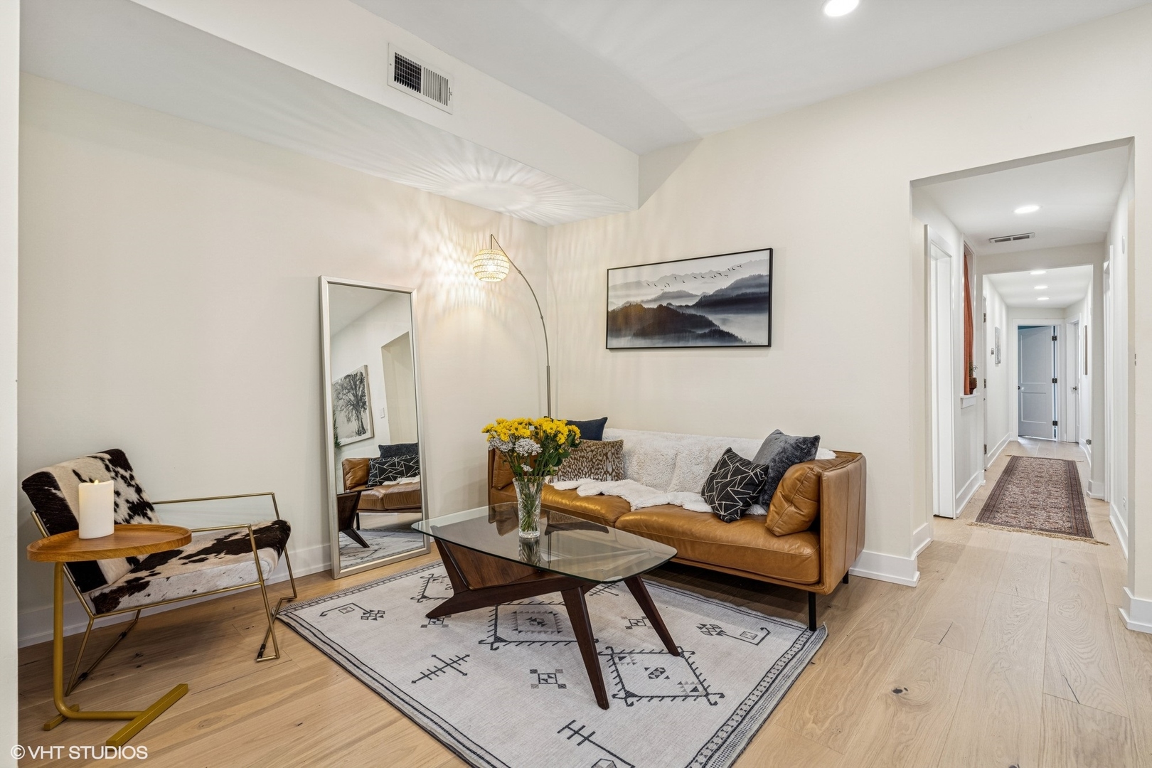 5103 North Clark Street, Unit 2 Chicago, IL 60640 - Photo 7 of 21 a living room with furniture and a rug