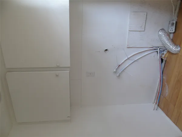 a view of small space with racks on the wall