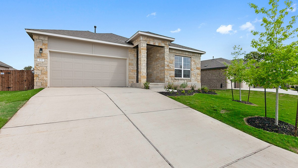 4317 Porter Farm Road Georgetown, TX 78628 - Photo 1 of 1 a front view of house with yard