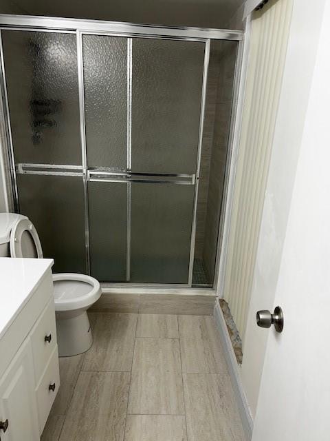 5570 Northwest 44th Street, Unit 201A Lauderhill, FL 33319 - Photo 4 of 5 a bathroom with a toilet and a shower