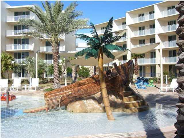 1110 Santa Rosa Boulevard, Unit A622 Fort Walton Beach, FL 32548 - Photo 11 of 27 a view of a palm trees in front of a building