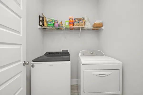 a utility room with dryer and washer