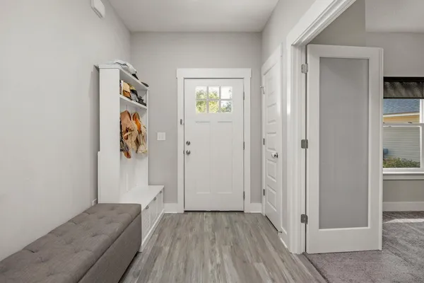 a view of entryway with wooden floor