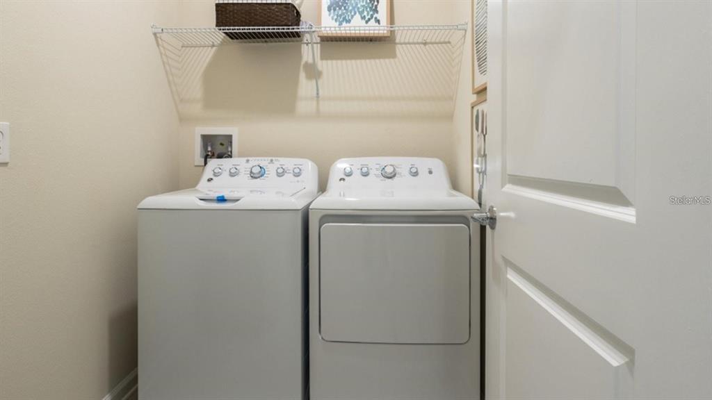 643 Grove Street Winter Haven, FL 33881 - Photo 11 of 16 a utility room with dryer and washer