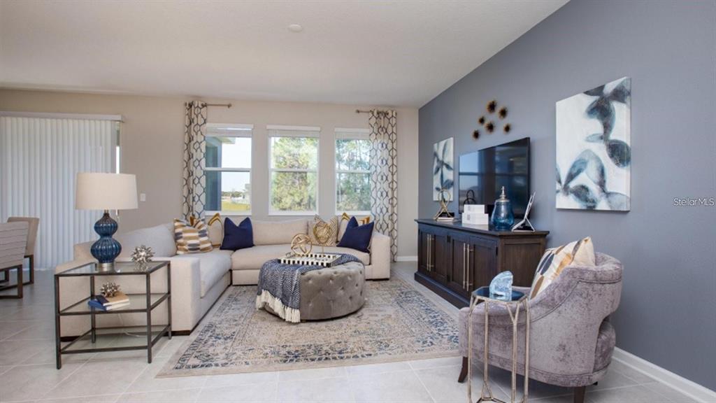643 Grove Street Winter Haven, FL 33881 - Photo 7 of 16 a living room with furniture and a window