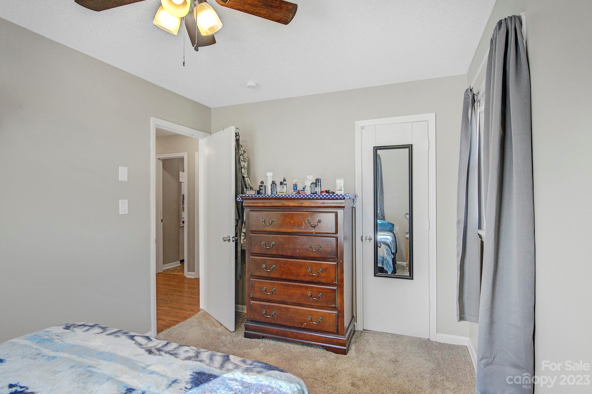 300 Newsome Road Salisbury, NC 28146 - Photo 16 of 27 a view of a bedroom with closet and cabinet