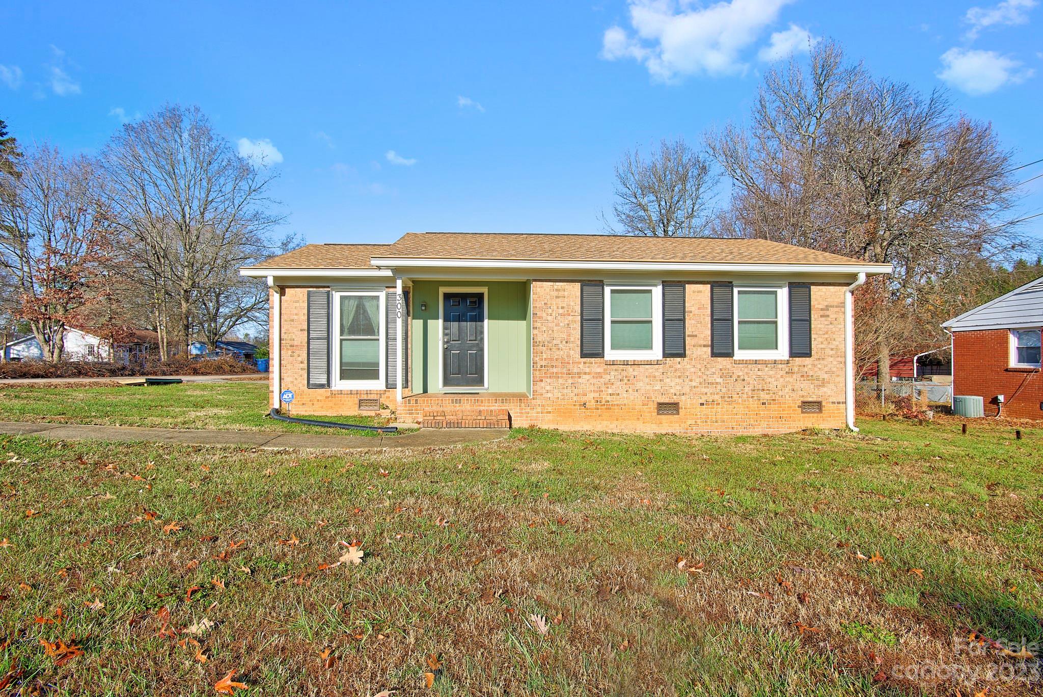 300 Newsome Road Salisbury, NC 28146 - Photo 2 of 27 a front view of a house with a garden