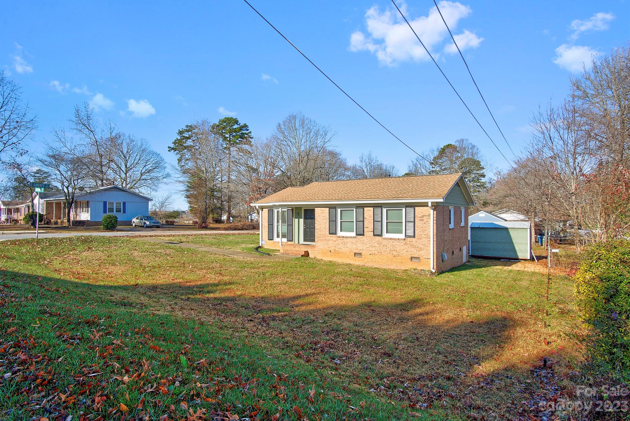 300 Newsome Road Salisbury, NC 28146 - Photo 3 of 27 a view of house with outdoor space and garden