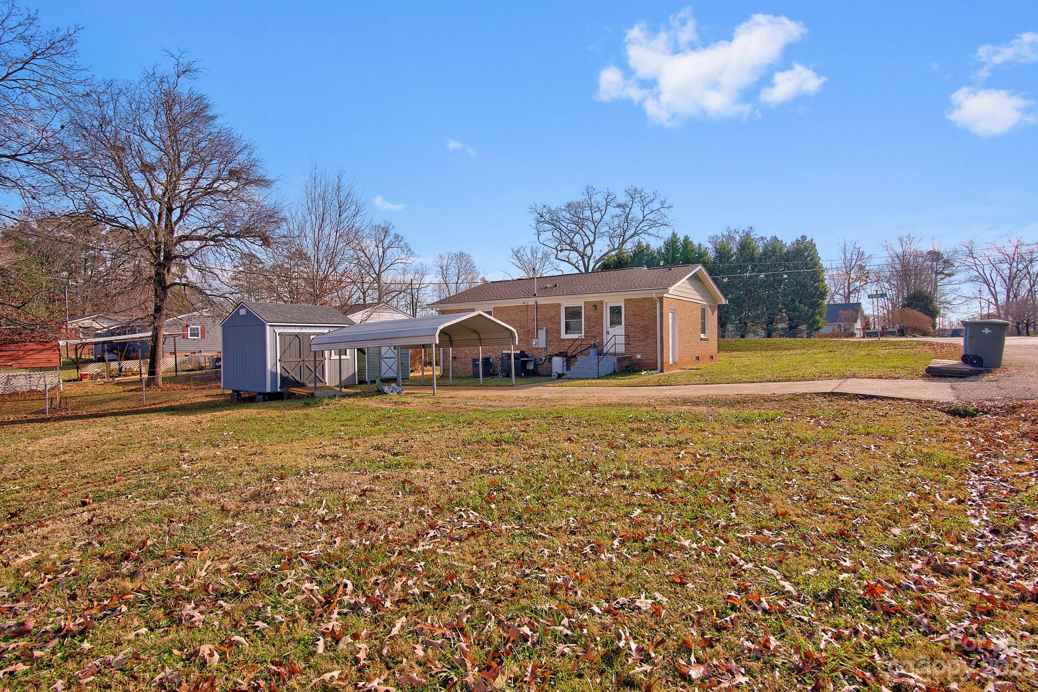 300 Newsome Road Salisbury, NC 28146 - Photo 5 of 27 a front view of a house with a yard and mountain view
