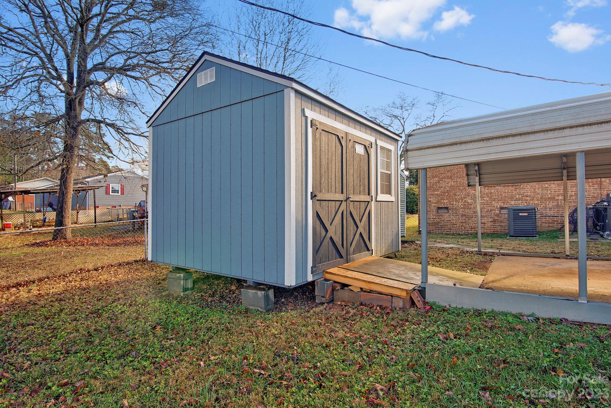 300 Newsome Road Salisbury, NC 28146 - Photo 6 of 27 a house view with a backyard space