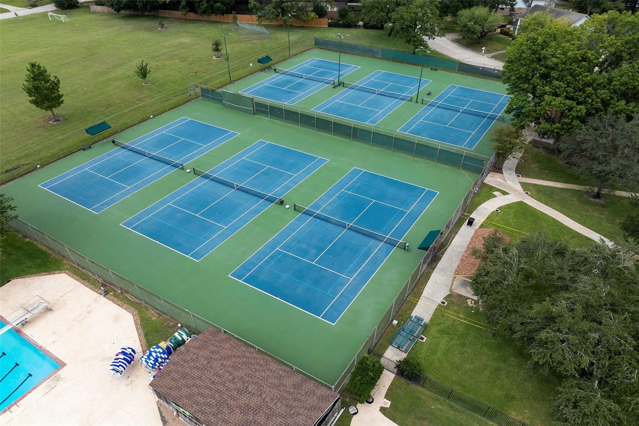 6507 Spring Leaf Drive Spring, TX 77379 - Photo 47 of 50 Spring Creek Forest also has tennis courts for residents' use, with 5 courts also featuring 4 pickleball courts for residents.