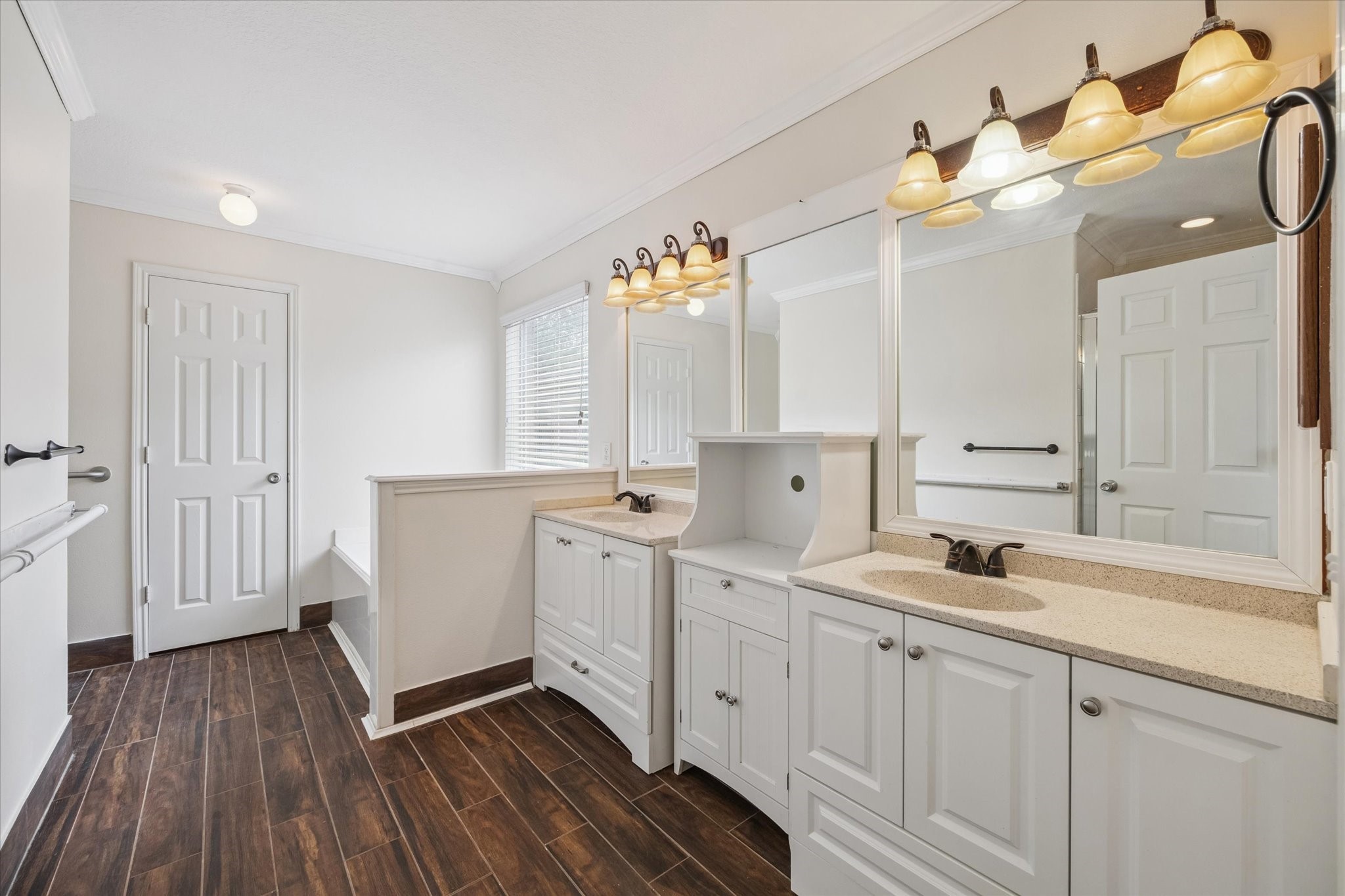 17610 Prospect Meadows Drive Houston, TX 77095 - Photo 15 of 33 a kitchen with a sink cabinets and wooden floor