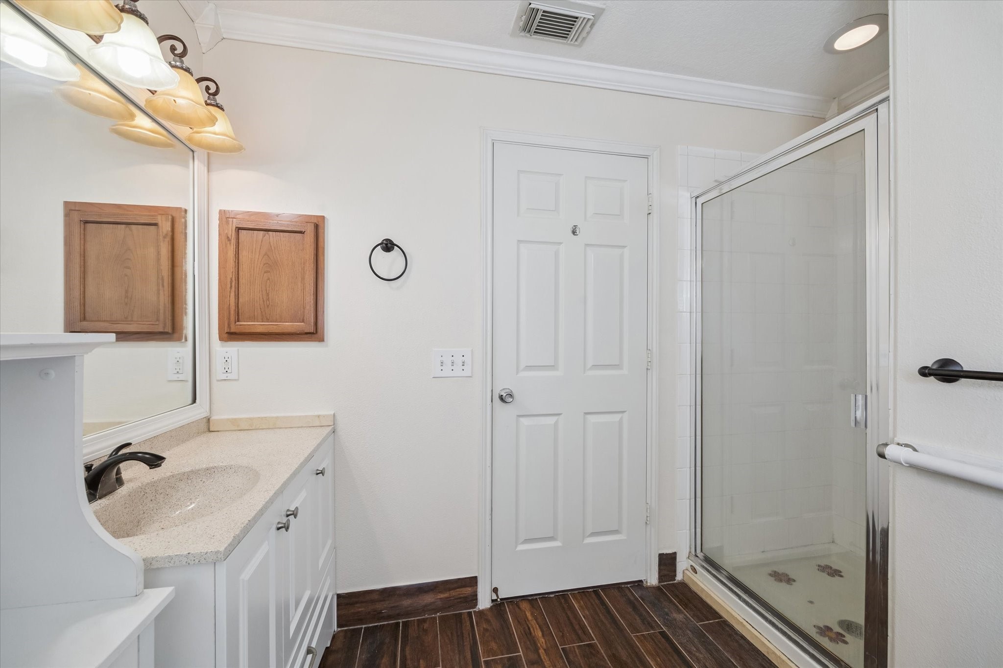 17610 Prospect Meadows Drive Houston, TX 77095 - Photo 16 of 33 a bathroom with a sink and a mirror