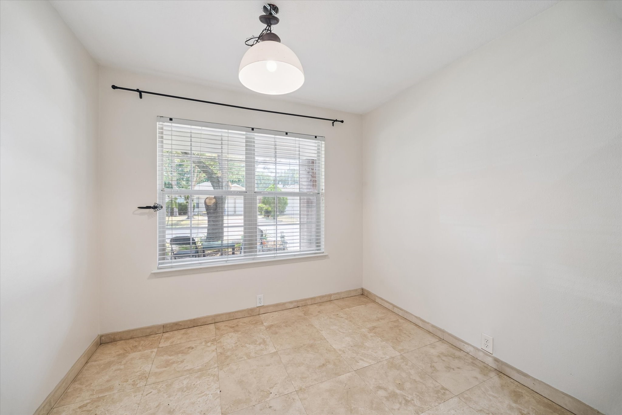 17610 Prospect Meadows Drive Houston, TX 77095 - Photo 7 of 33 an empty room with a window