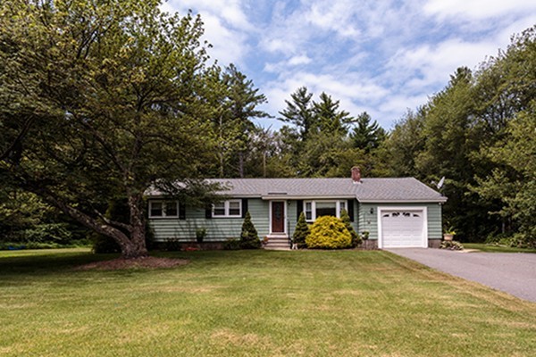 11 Garland Road Chelmsford, MA 01824 - Photo 1 of 19 a front view of a house with swimming pool and porch