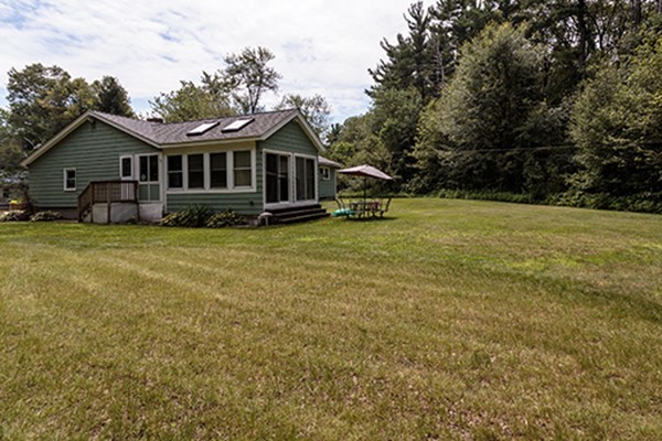 11 Garland Road Chelmsford, MA 01824 - Photo 17 of 19 a front view of a house with a garden