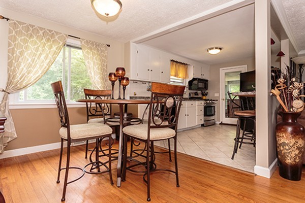 11 Garland Road Chelmsford, MA 01824 - Photo 4 of 19 a view of a livingroom and dining room
