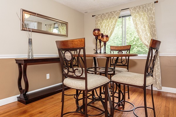 11 Garland Road Chelmsford, MA 01824 - Photo 5 of 19 a view of a dining room with furniture and a window