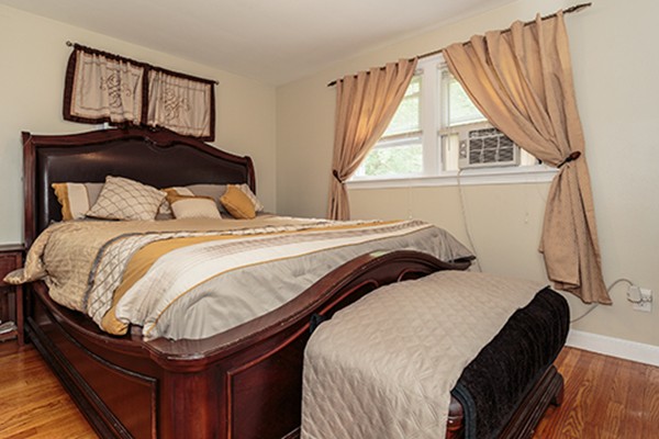 11 Garland Road Chelmsford, MA 01824 - Photo 10 of 19 a bedroom with a bed and window