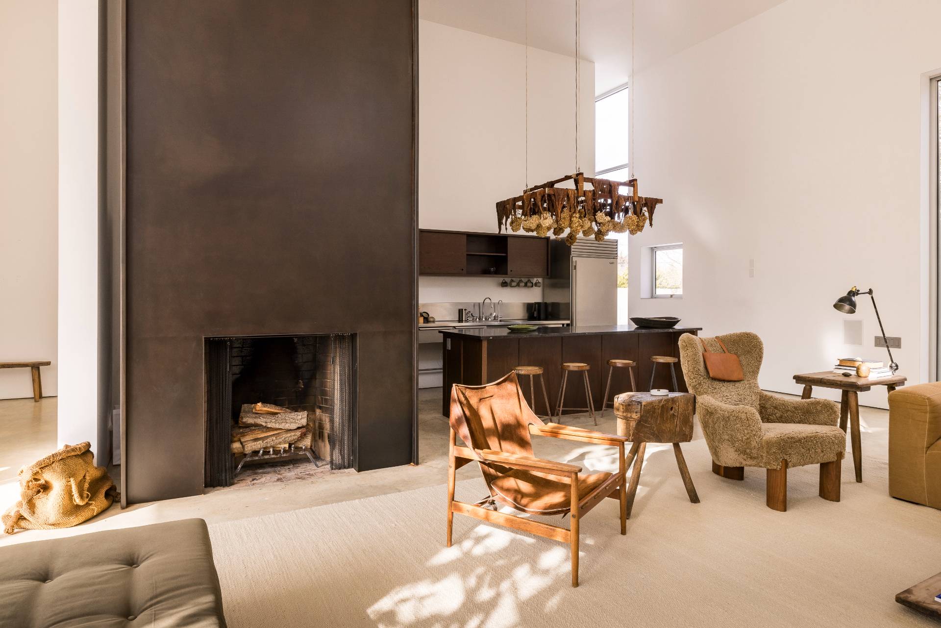 78 Windmill Lane Bridgehampton, NY 11932 - Photo 14 of 32 a living room with furniture and a fireplace