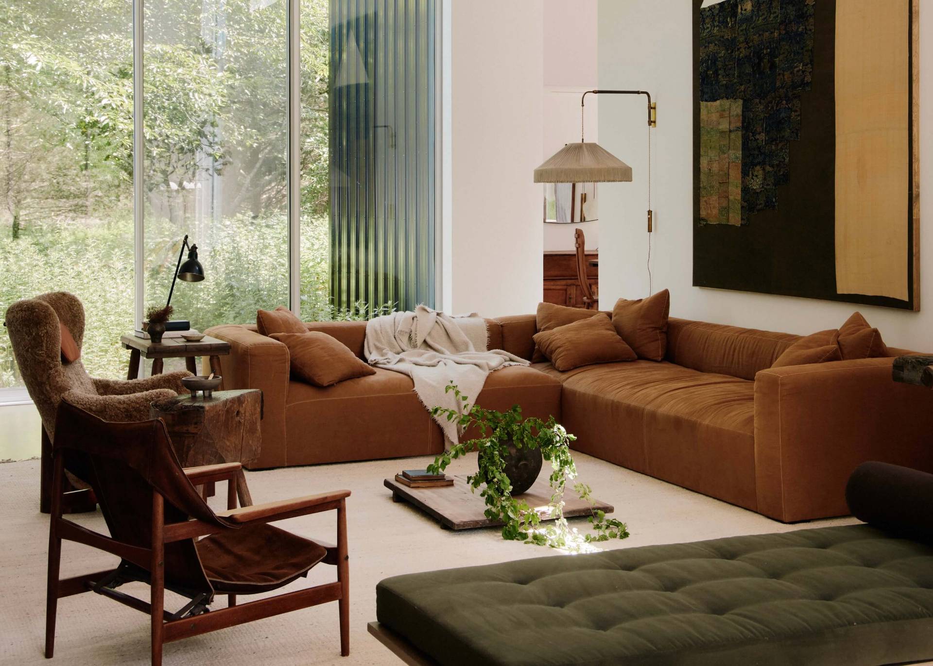 78 Windmill Lane Bridgehampton, NY 11932 - Photo 10 of 32 a living room with furniture and a chandelier