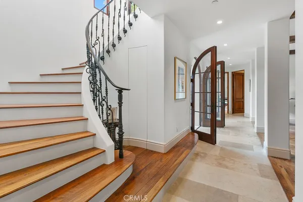 a view of a patio with furniture and a umbrella