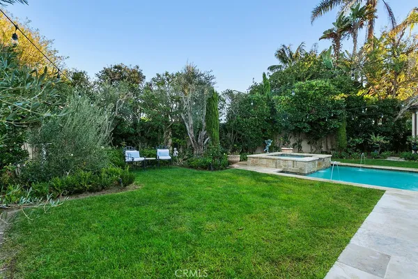 a bathroom with a sink mirror and toilet