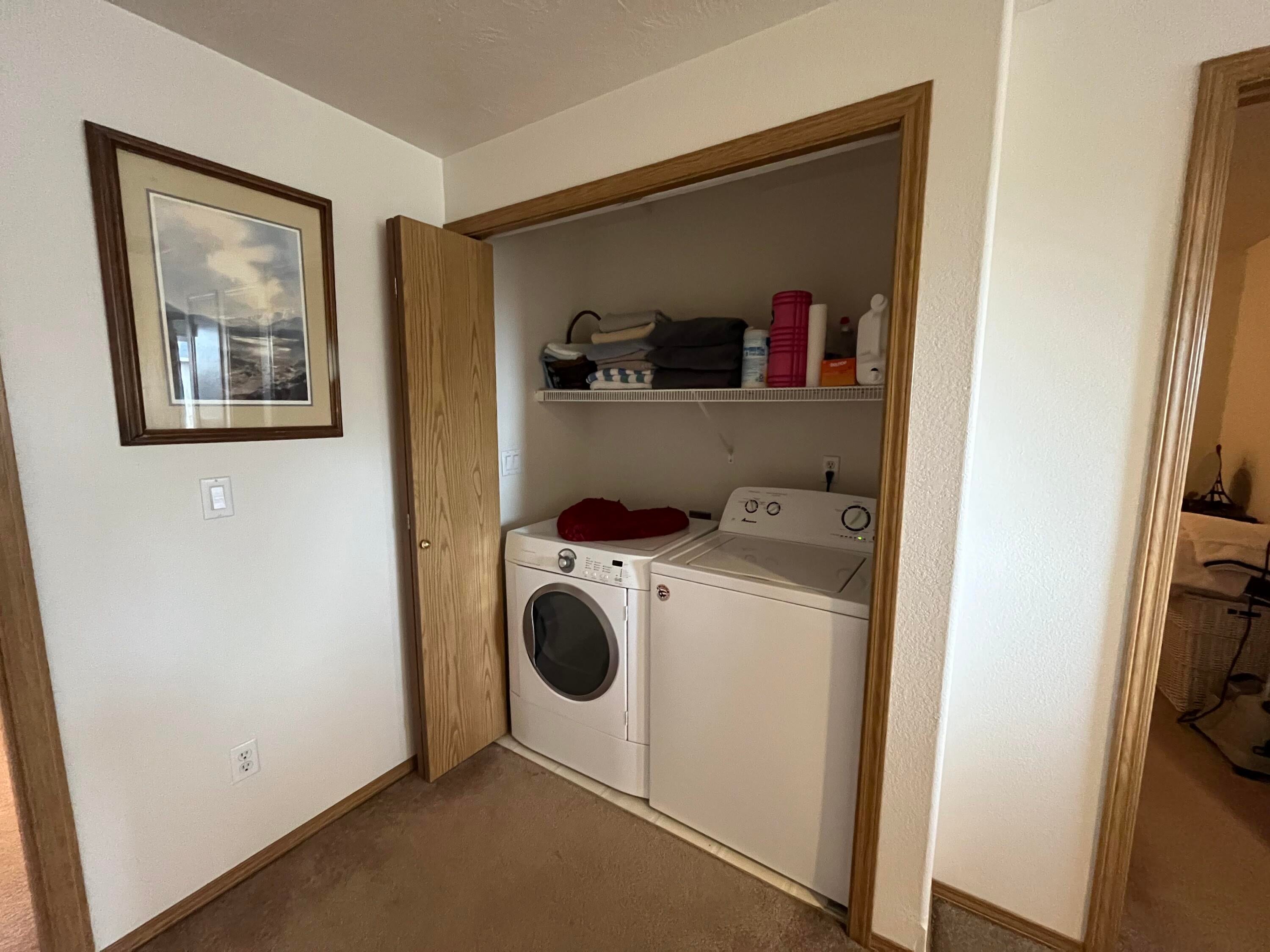1440 Southwest 16th Street Redmond, OR 97756 - Photo 15 of 30 Upstairs laundry closet. Sale includes a washer and dryer.