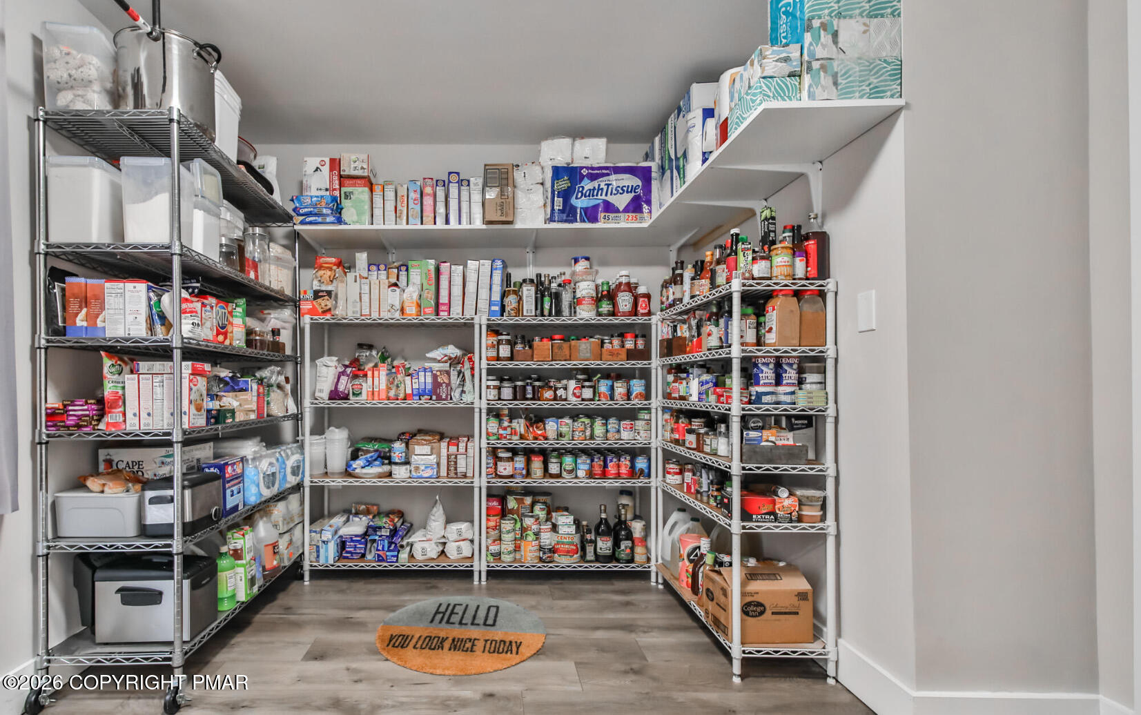 324 Remington Road East Stroudsburg, PA 18301 - Photo 16 of 35 a room with lots of books and a large shelf